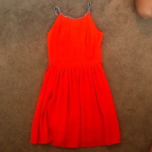 Orange pleated dress